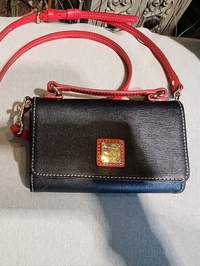 Dooney & Bourke Black Crossbody Wallet with Red Strap and Gold Hardware